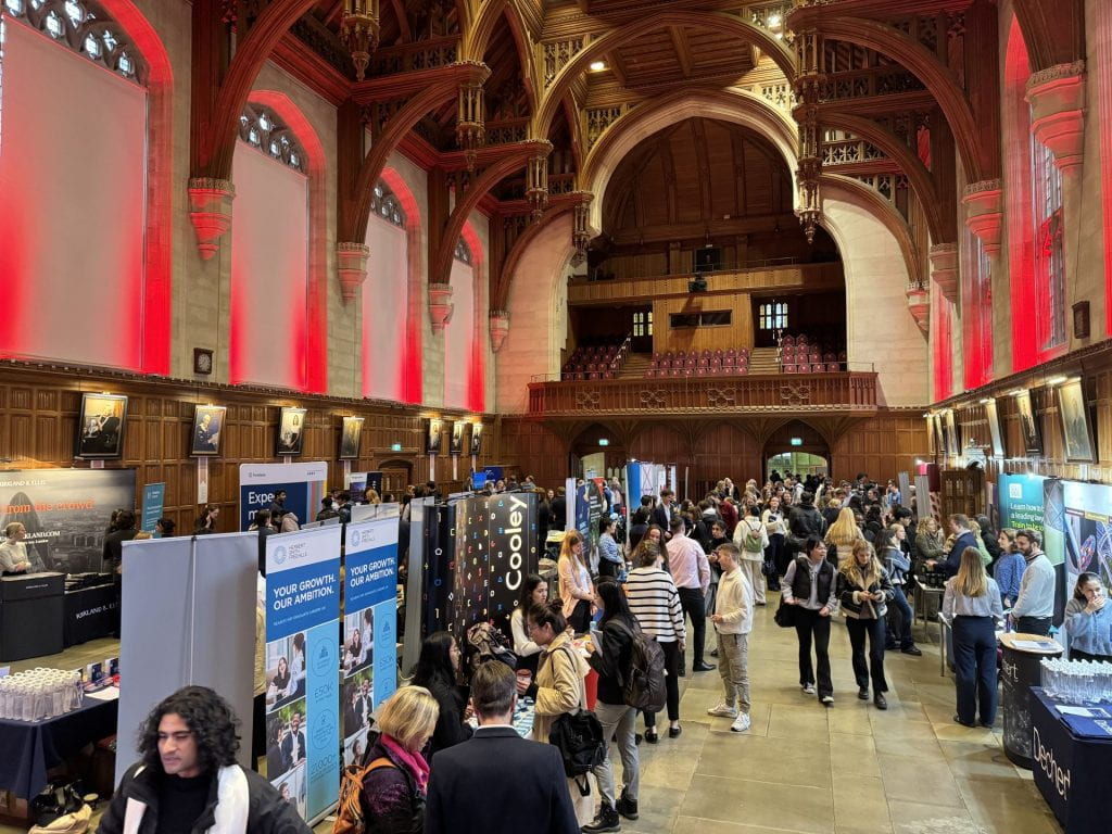 Image of the University of Bristol Law Fair 2023 showing student networking in the Great Hall of Wills Memorial Building 